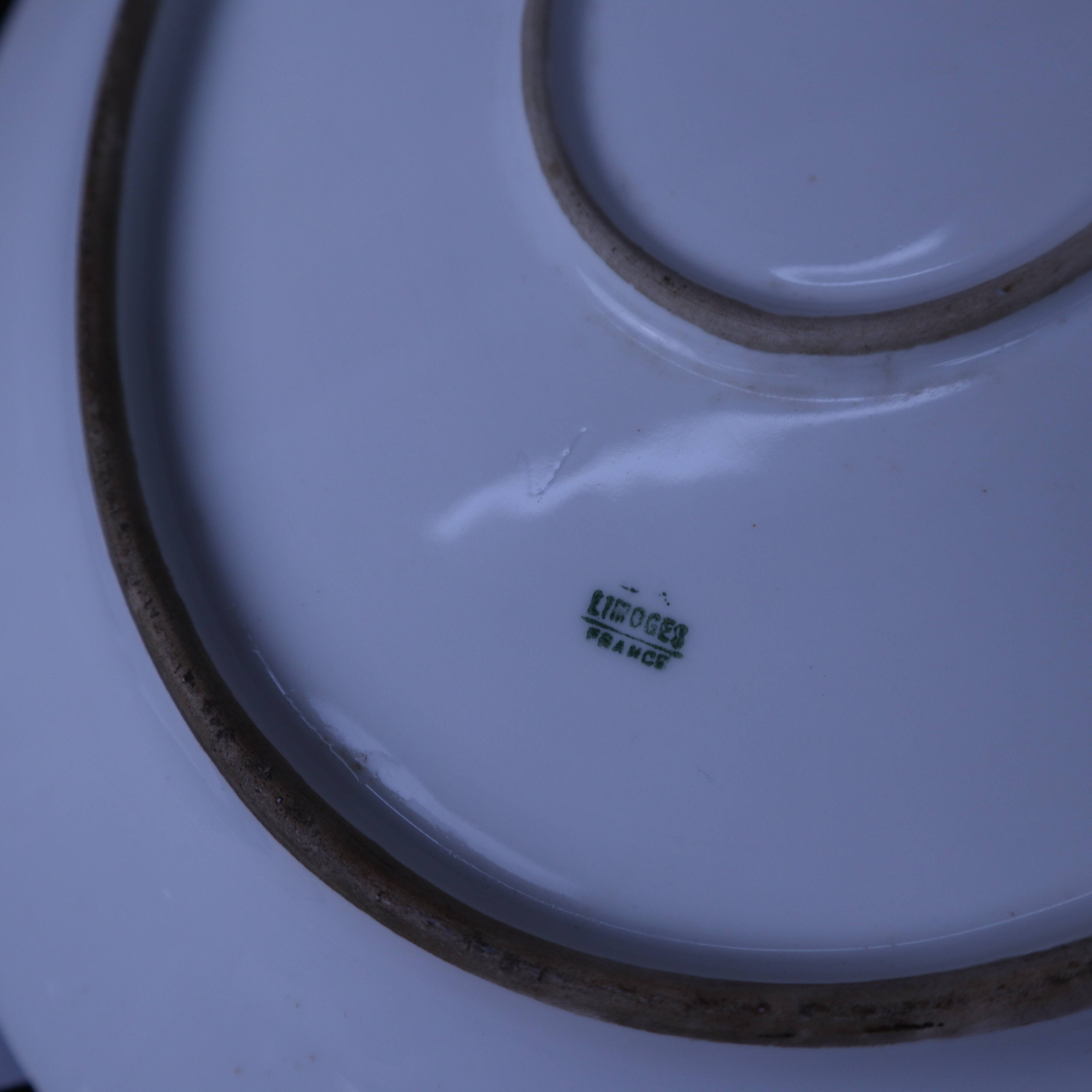 Antique large oval Limoges porcelain dish with painted pheasant decoration.