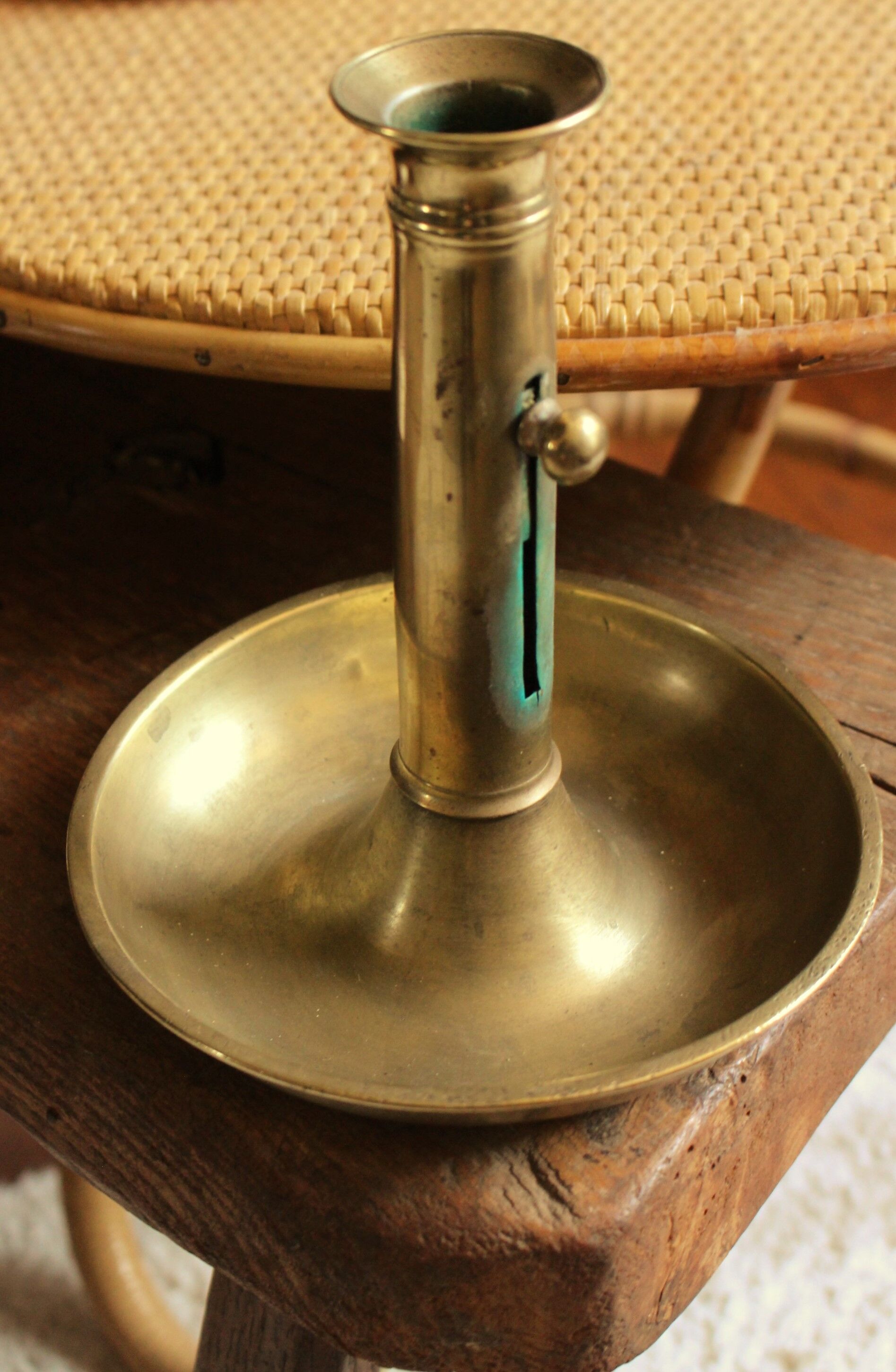 Brass pusher round cut candle holder