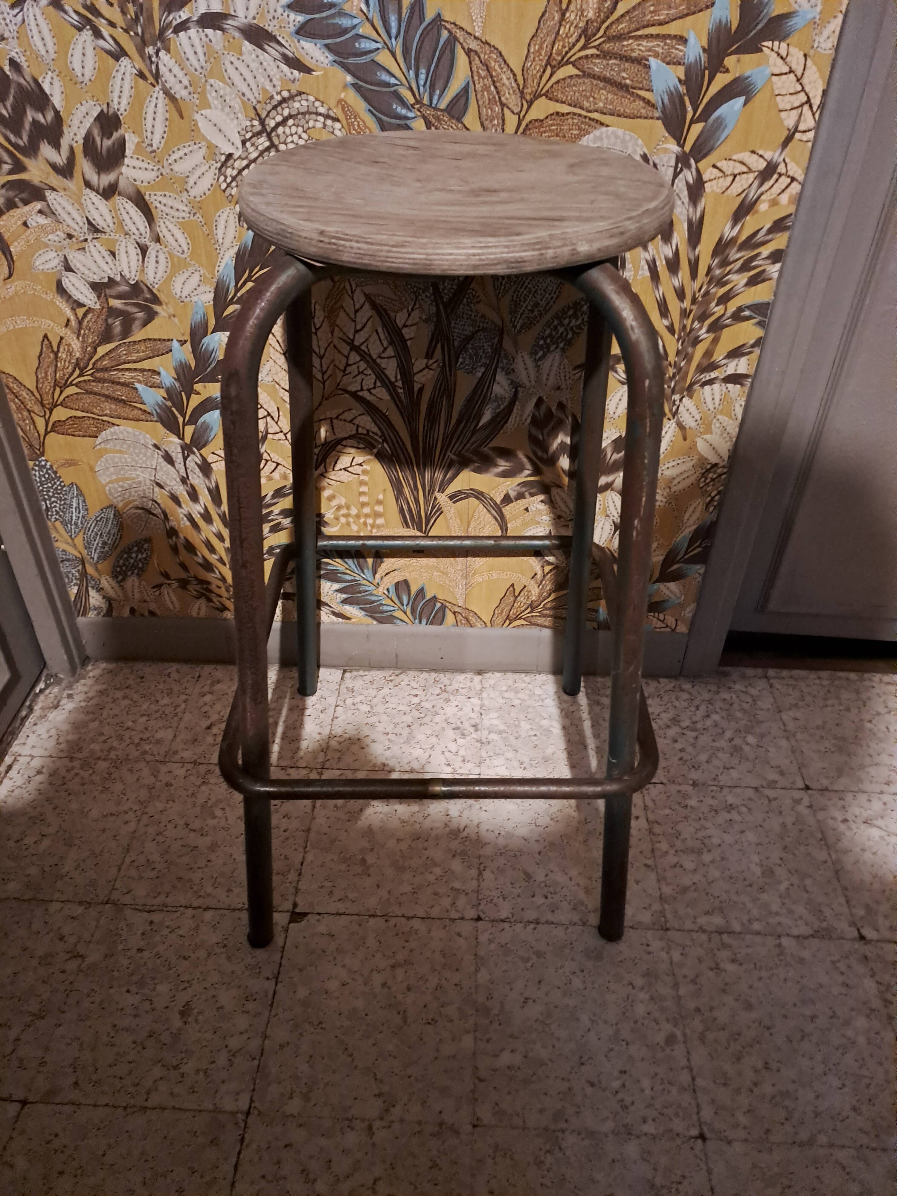 High metal stool and wooden seat Labo style dating from the 1940s industrial style