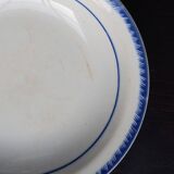 Antique shallow dish from Badonviller with blue flower decoration.