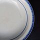 Plat creux ancien en faïence de Badonviller décor fleurs bleues