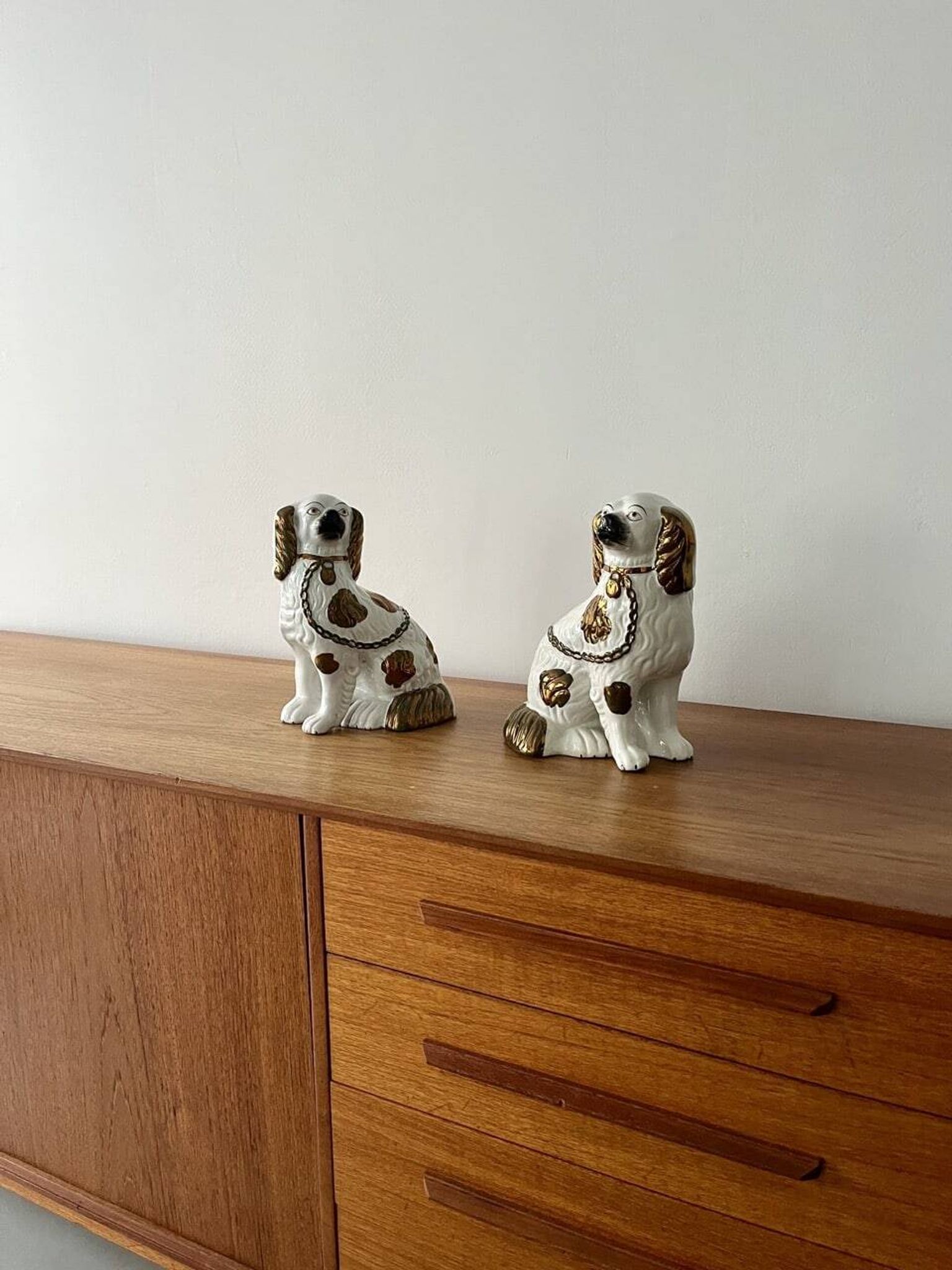 Pair of Staffordshire ceramic dogs – England, 20th century