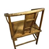 China 20th century: Horseshoe-shaped armchair in natural wood