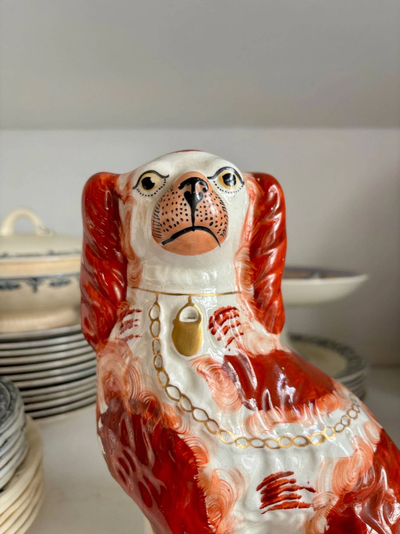 Staffordshire porcelain King Charles Cavalier dog in red, number 1, 19th century.