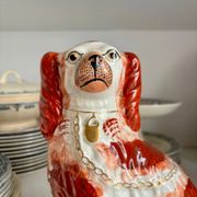 Staffordshire porcelain King Charles Cavalier dog in red, number 1, 19th century.