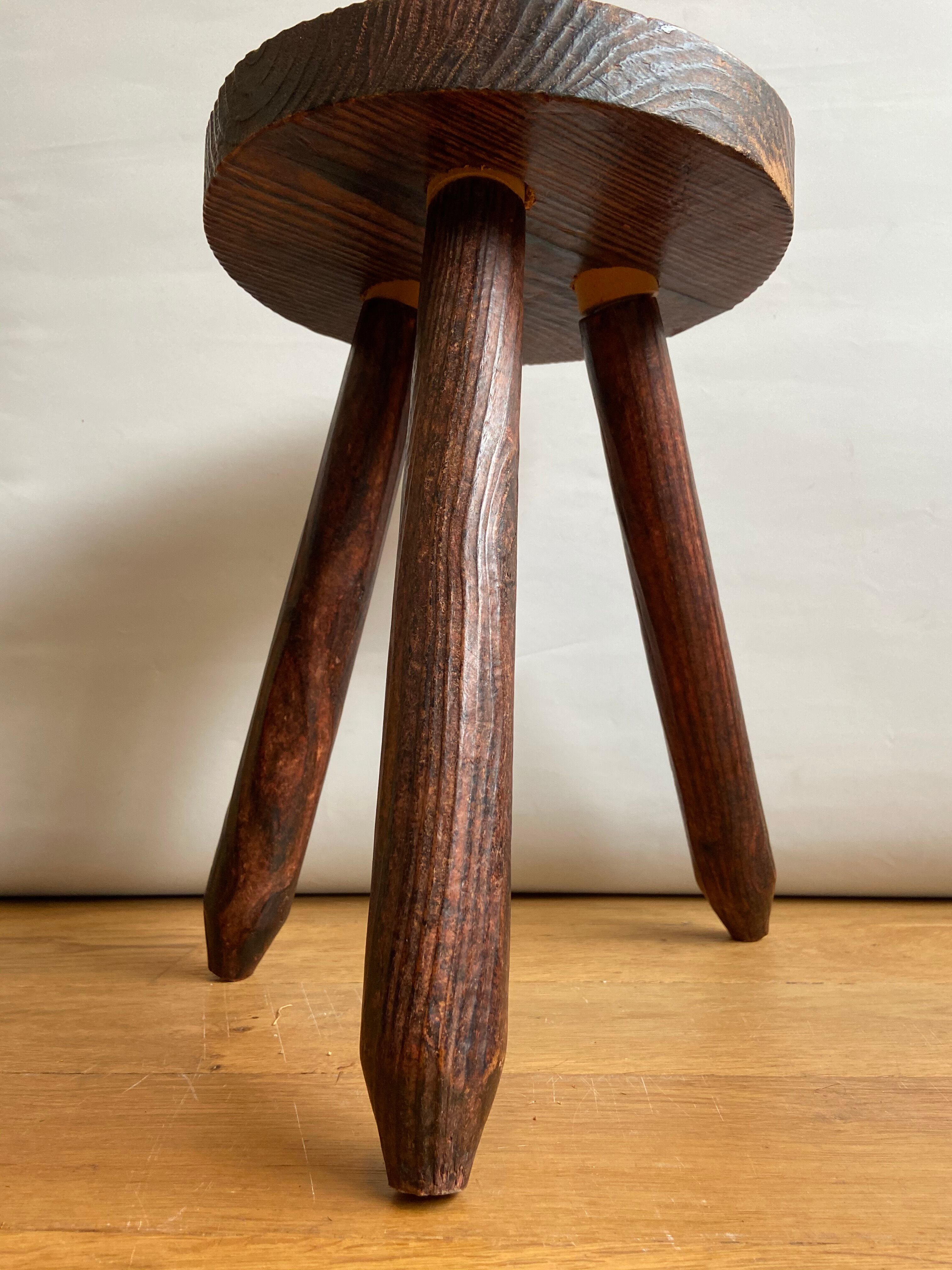 Wooden tripod stool
