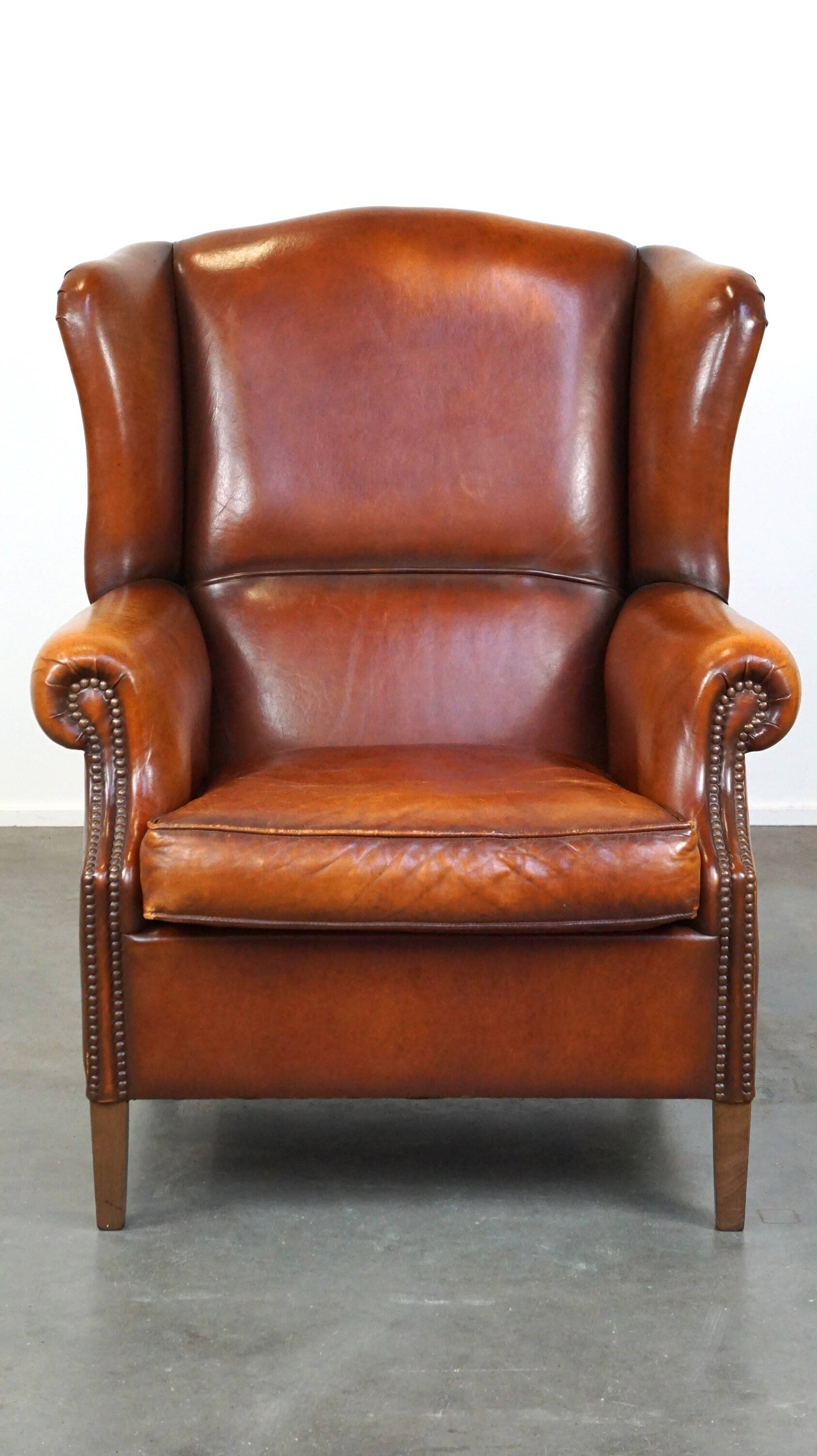 Beautiful and Comfortable Sheepskin Wingback Armchair with a Wonderful Patina