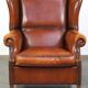 Beautiful and Comfortable Sheepskin Wingback Armchair with a Wonderful Patina