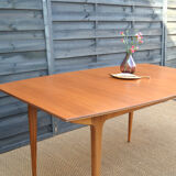 Single extension dining table by McIntosh