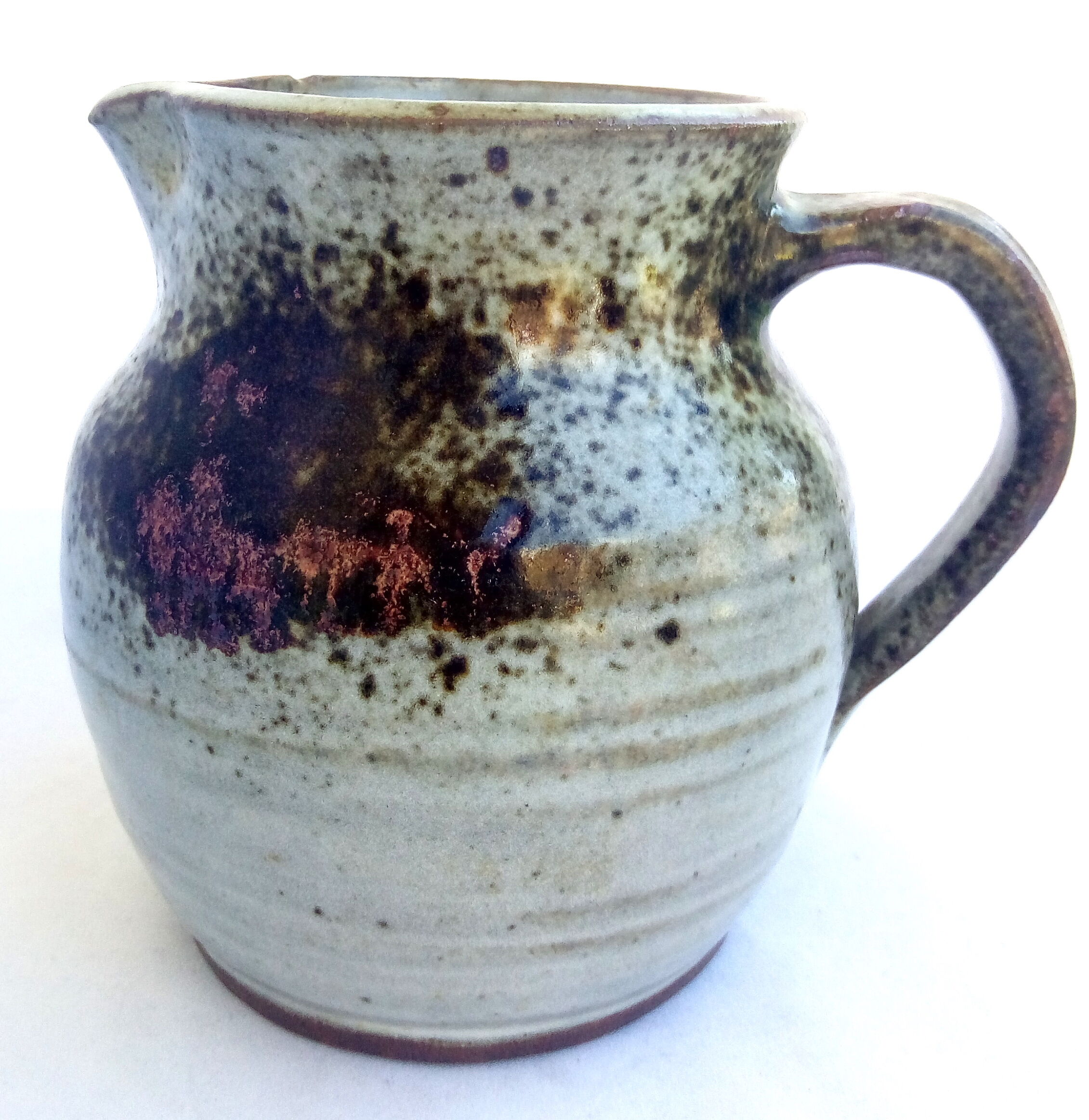 Sarthois pitcher in grey sandstone and rust effect