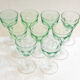 Set of nine glasses on foot in cut glass