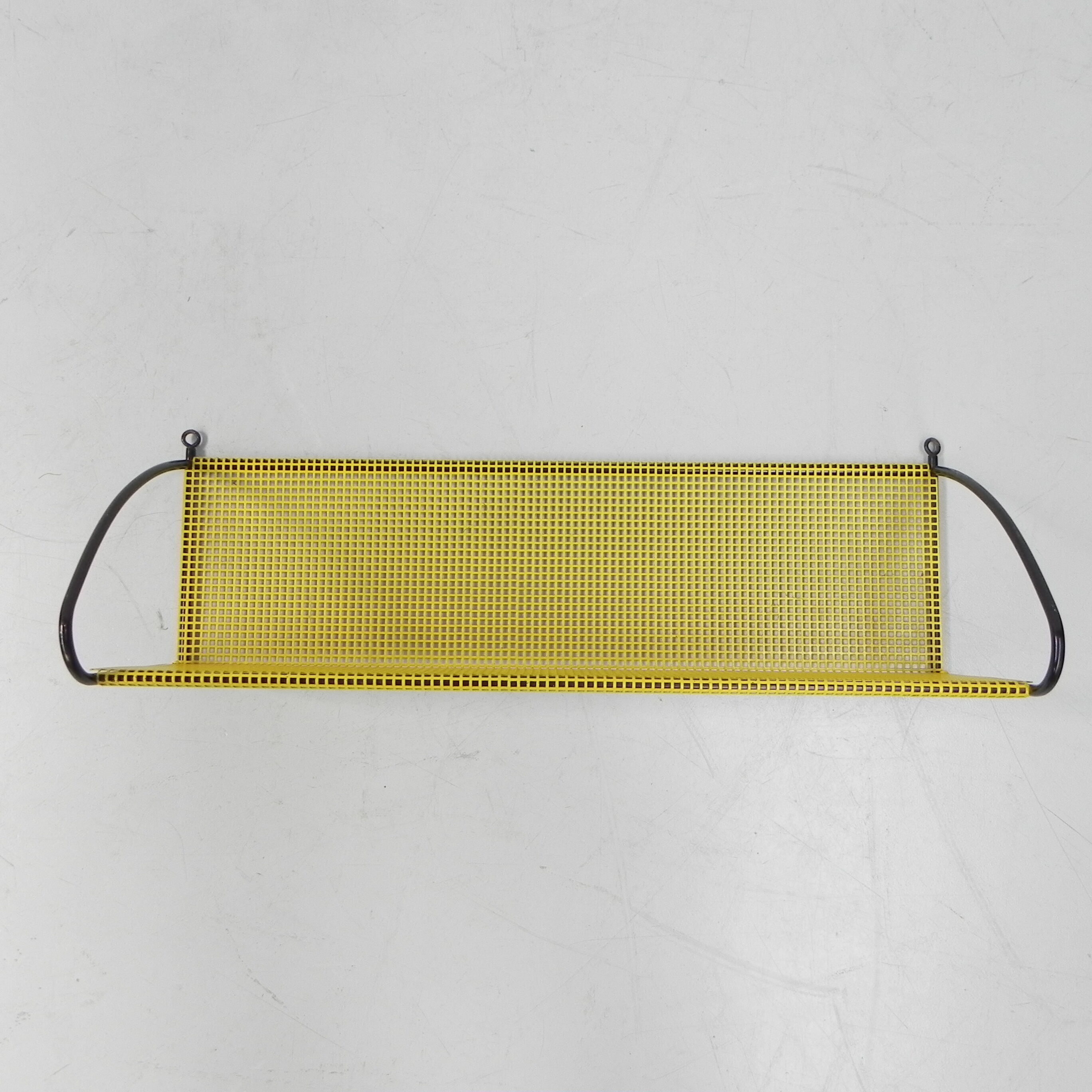 Pilastro wall rack with perforated steel plate