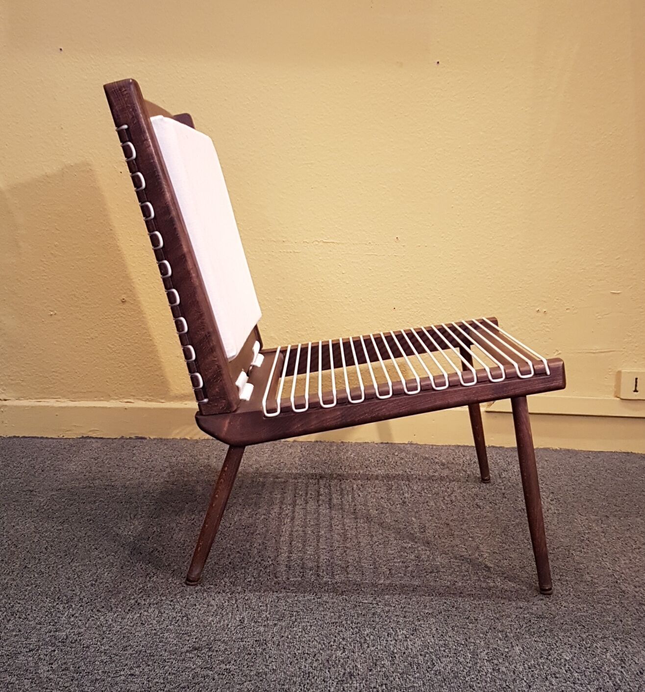 Triumph low armchairs by George Tigien for the European House