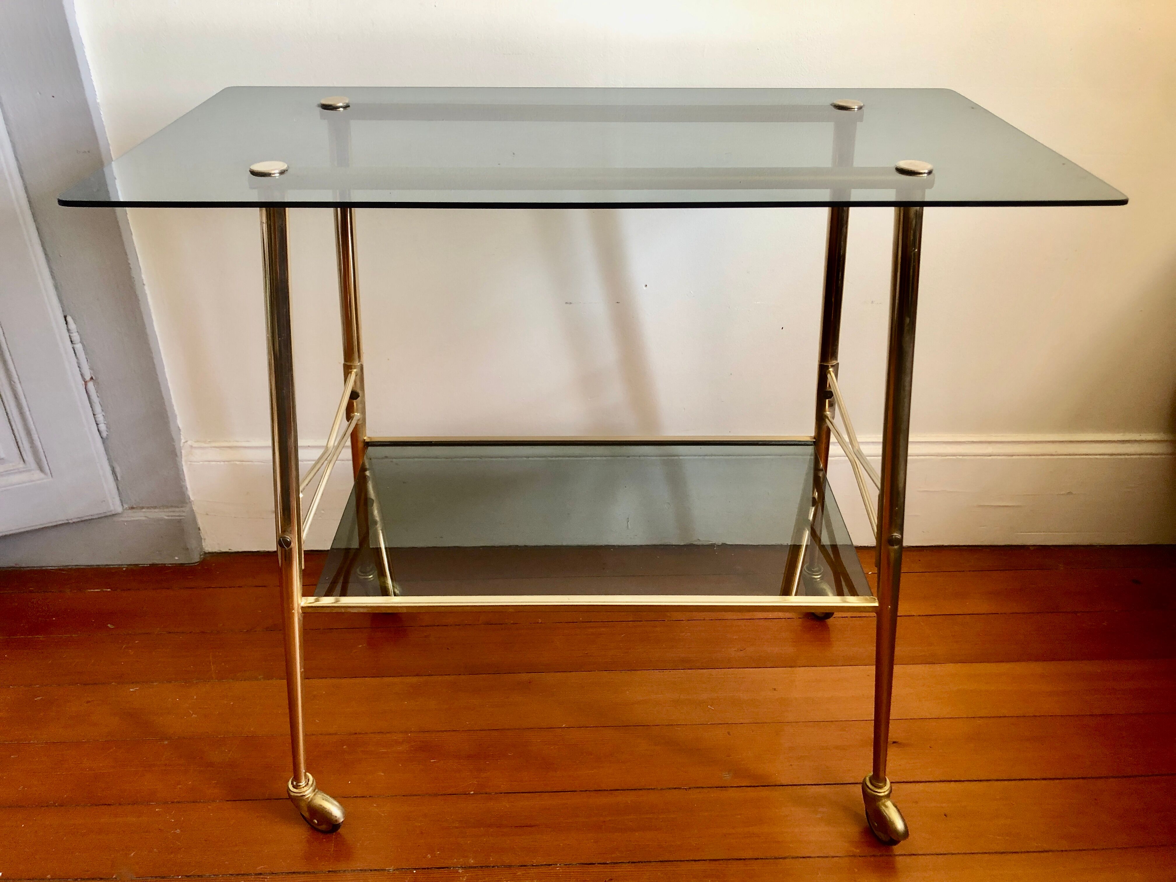 Smoked glass and gilded brass trolley