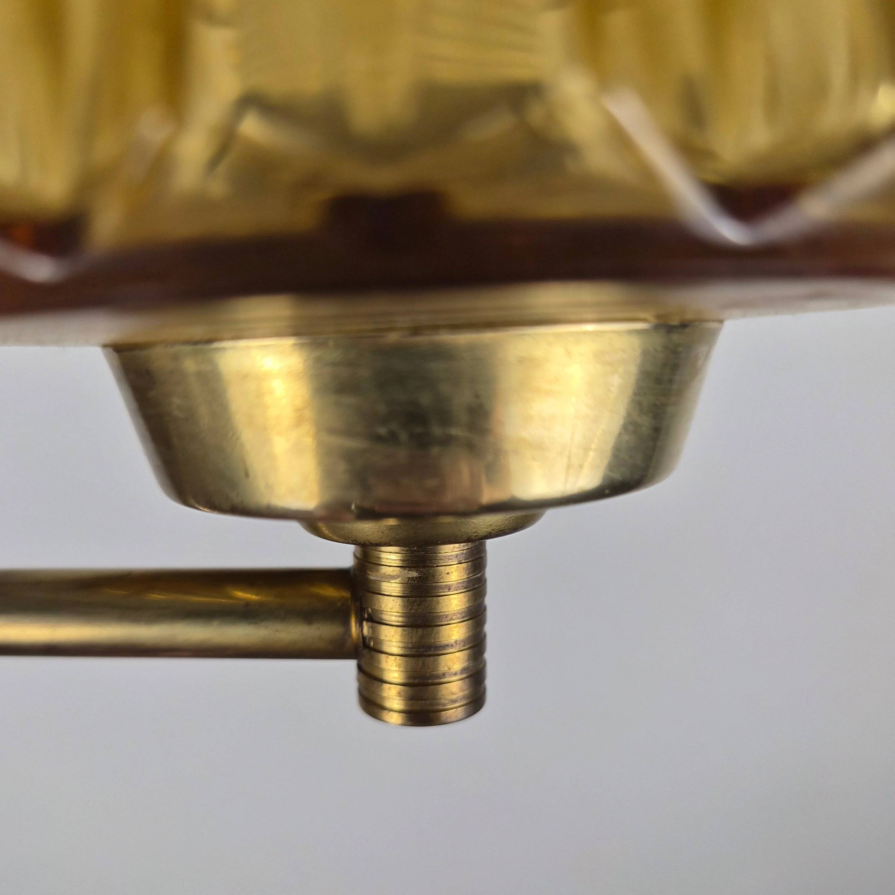 Wall lamp in rosewood, brass and glass, Denmark, 1960.