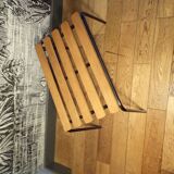 Old 1950s suitcase bench with wooden slats