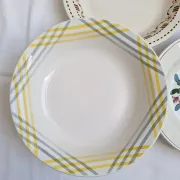 Shallow dish Gien orange and black model 456, Moulin des Loups yellow and grey.