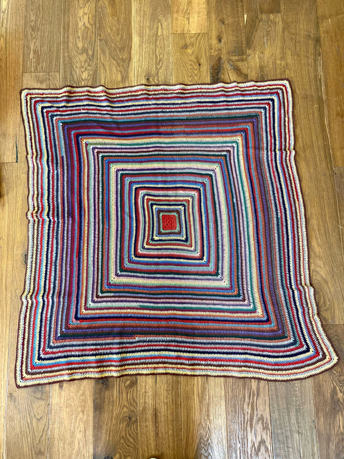 Hand crocheted wool blanket plaid