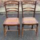 Two 19th-century carved chairs in solid wood and woven rope