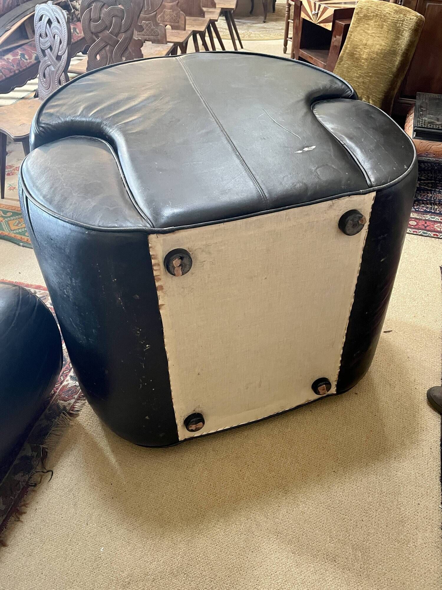 Pair of black leather club armchairs, twentieth century