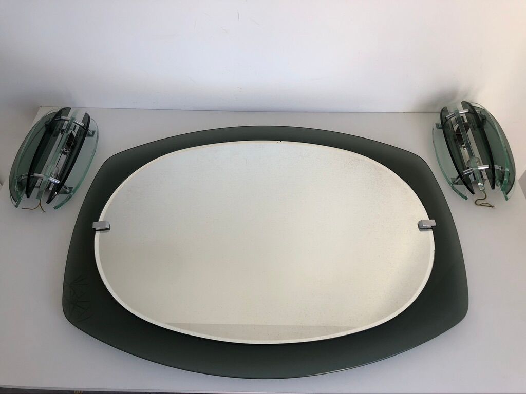 Veca mirror and 2 matching Veca wall lights made in Italy.