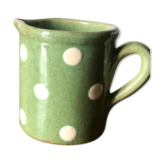 Tiny old pitcher in Savoyard earthenware, light green color with cream peas