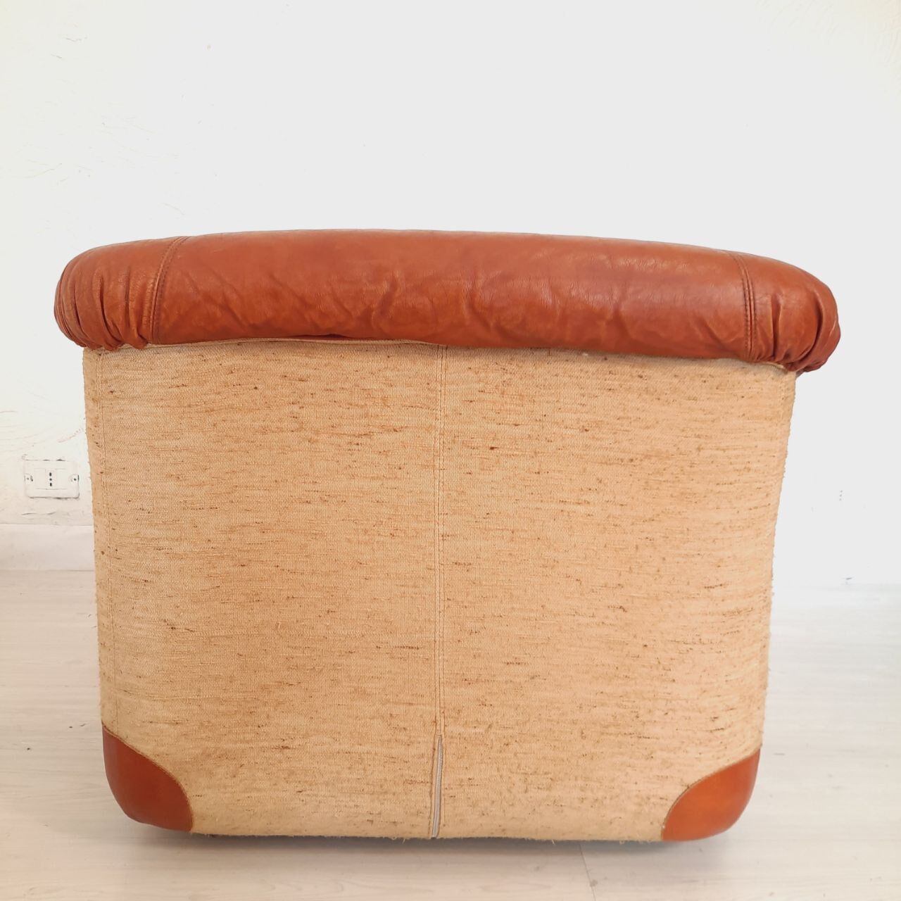 Four vintage armchairs, leather and fabric, 70s