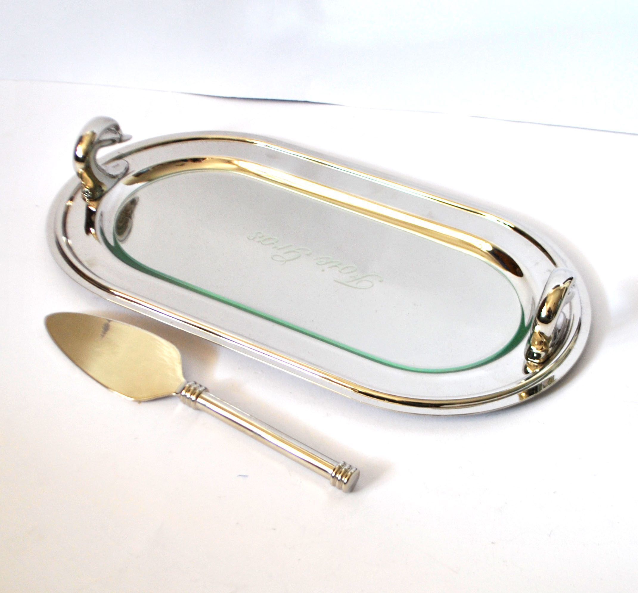Vintage silver-plated foie gras platter with goose head decoration and serving spatula.