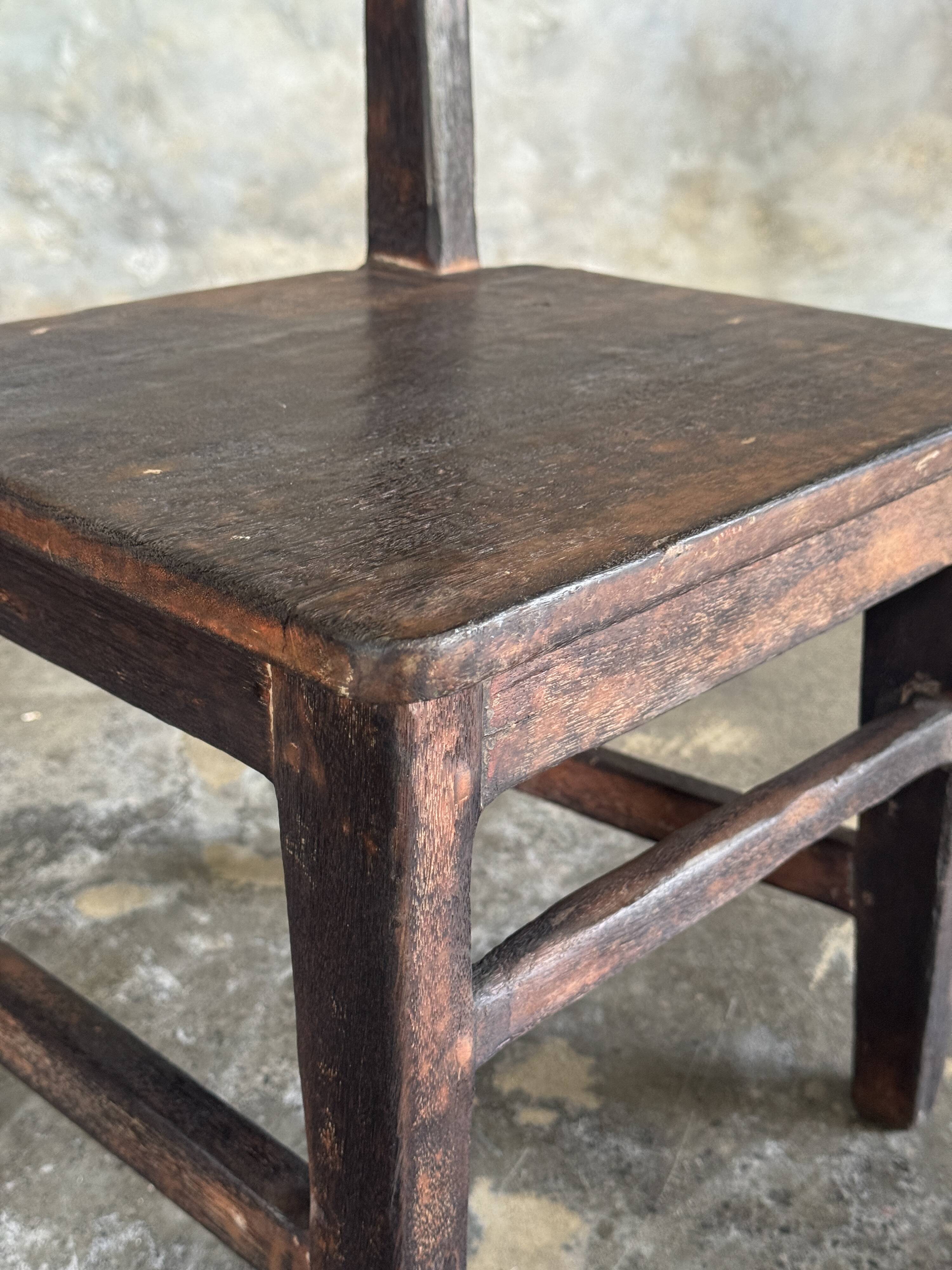 Small antique Indonesian children's chair in teak.