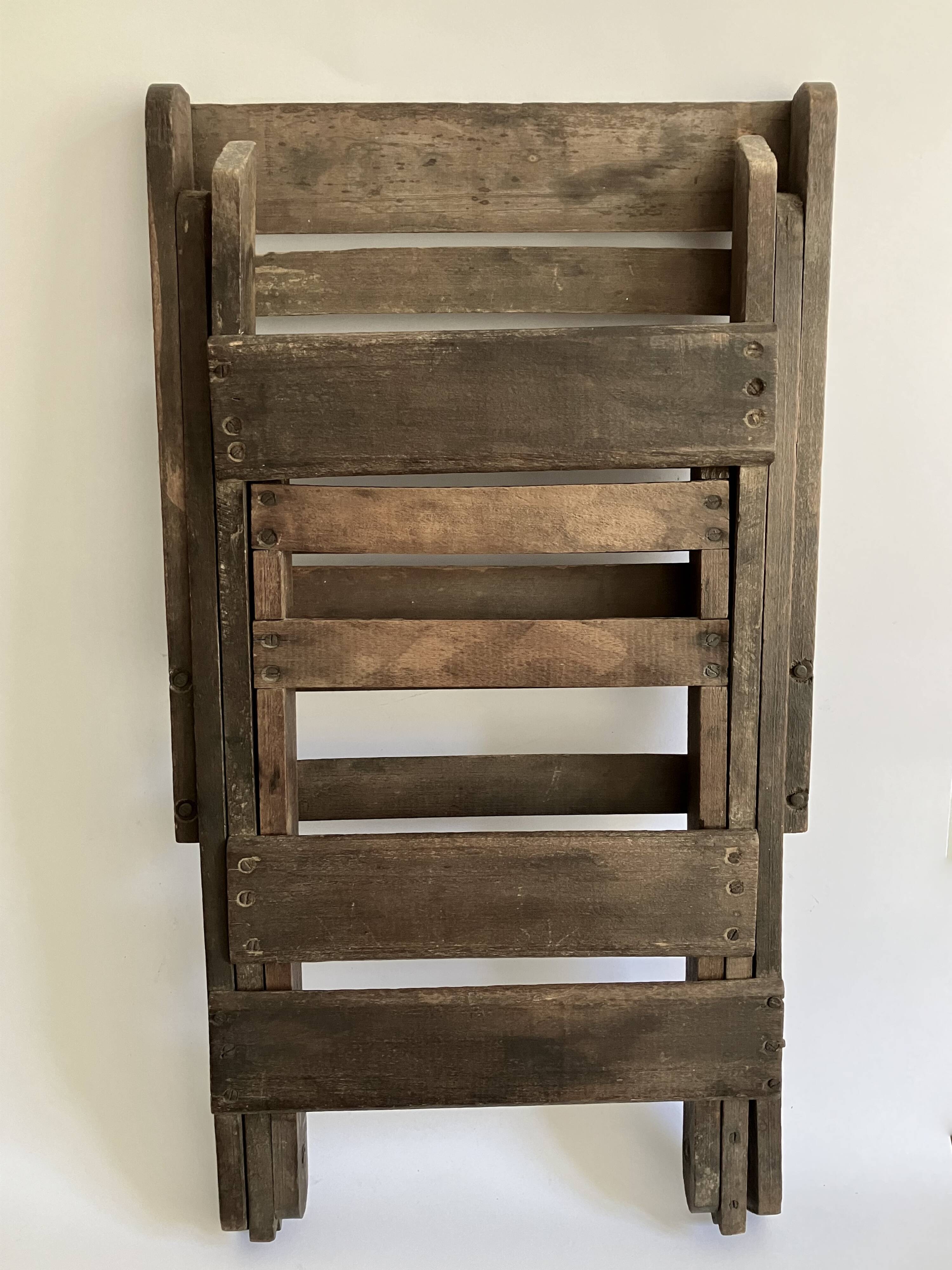 Ancienne chaise pliante avec dossier