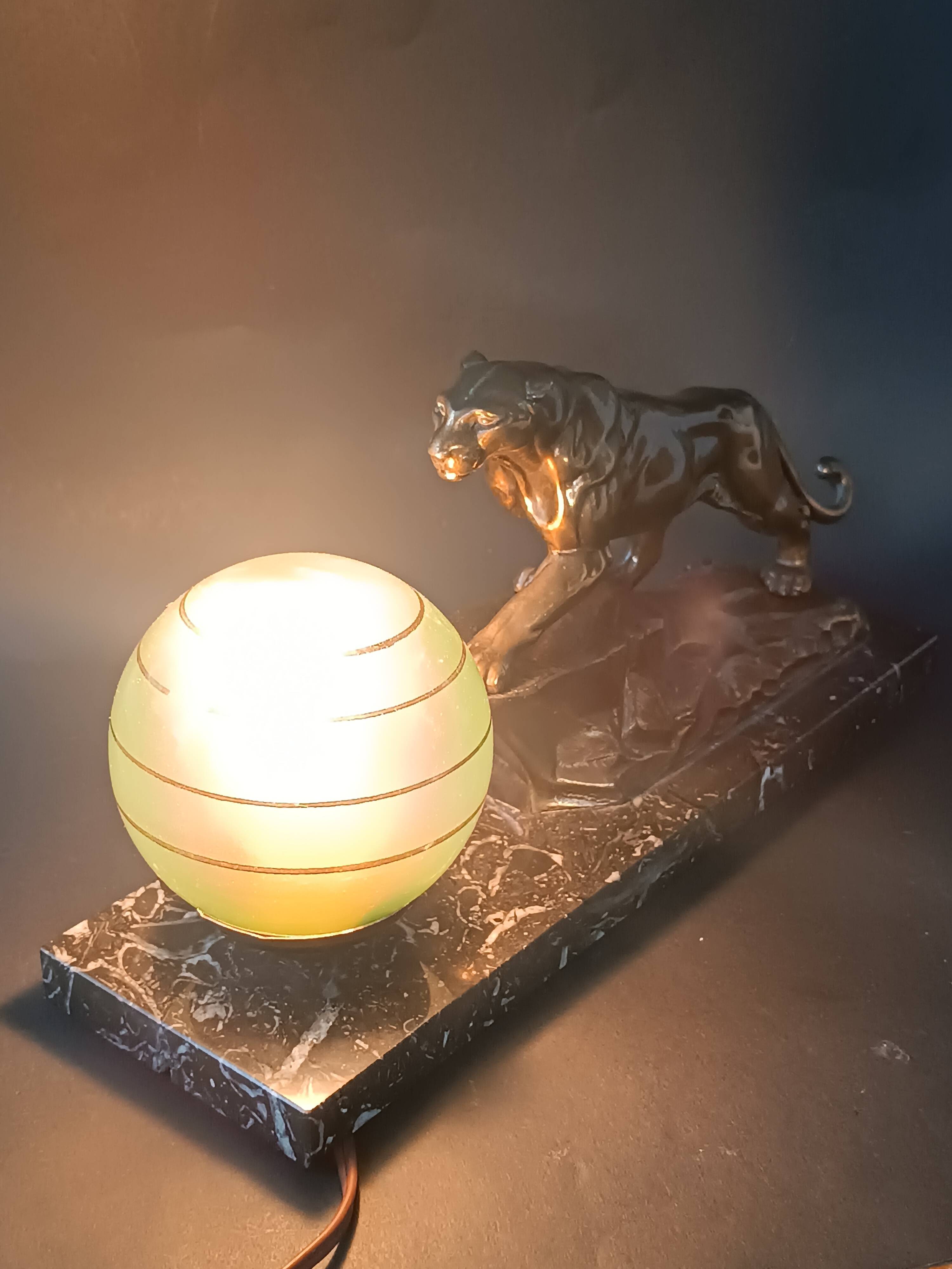 Panther desk lamp in spelter on a black and white marble base 1925