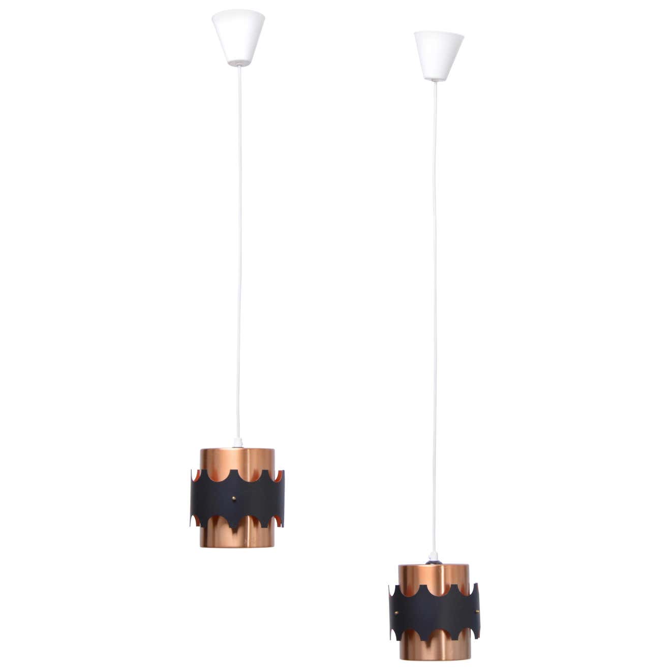Set of two mid-century copper-colored German pendant lamps