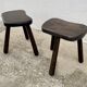 Pair of vintage stained wood tripod stools from the 1970s