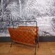 Rattan and metal magazine holder