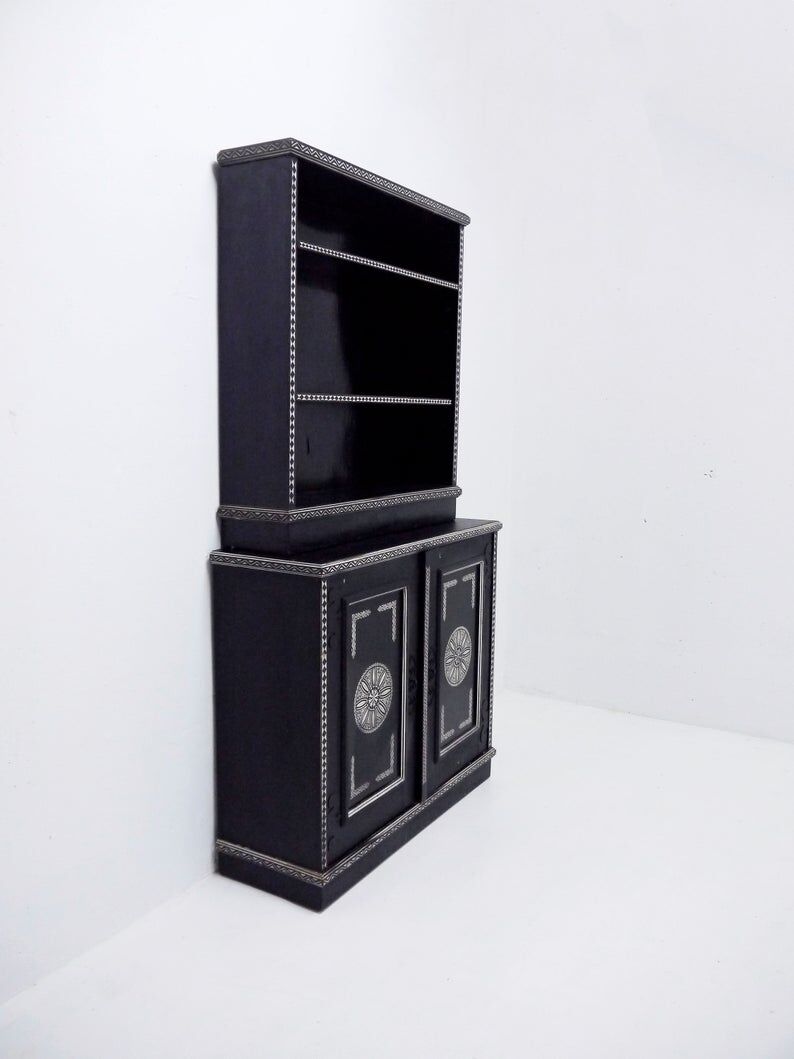 Antique wooden cabinet painted in black and with incised white painted decorations, Ettore Zaccari, Italy c 1910