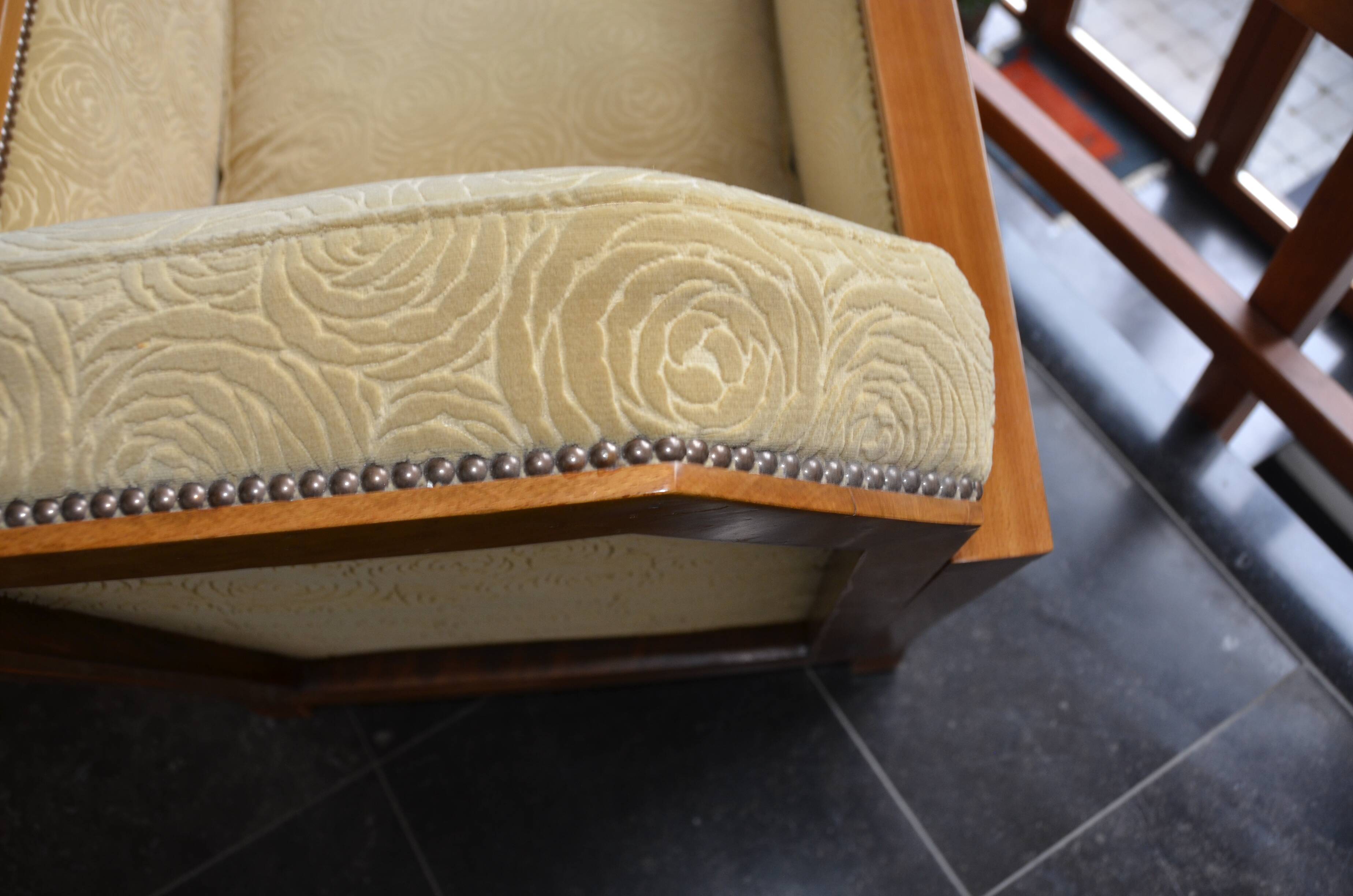 Pair of Art Deco armchairs and poufs