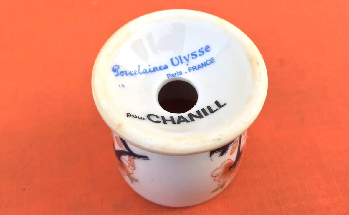 Ulysse Paris porcelain egg cup for Chanill with floral decoration.