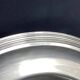 Circular silver-plated metal dish signed ercuis