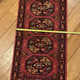 Handmade persian rug in pure virgin wool from the mid-20th century.