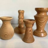 Four wooden vases and candlesticks
