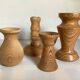 Four wooden vases and candlesticks