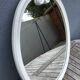 Oval mirror enamelled cast iron and its hook, circa 1950 39x49cm