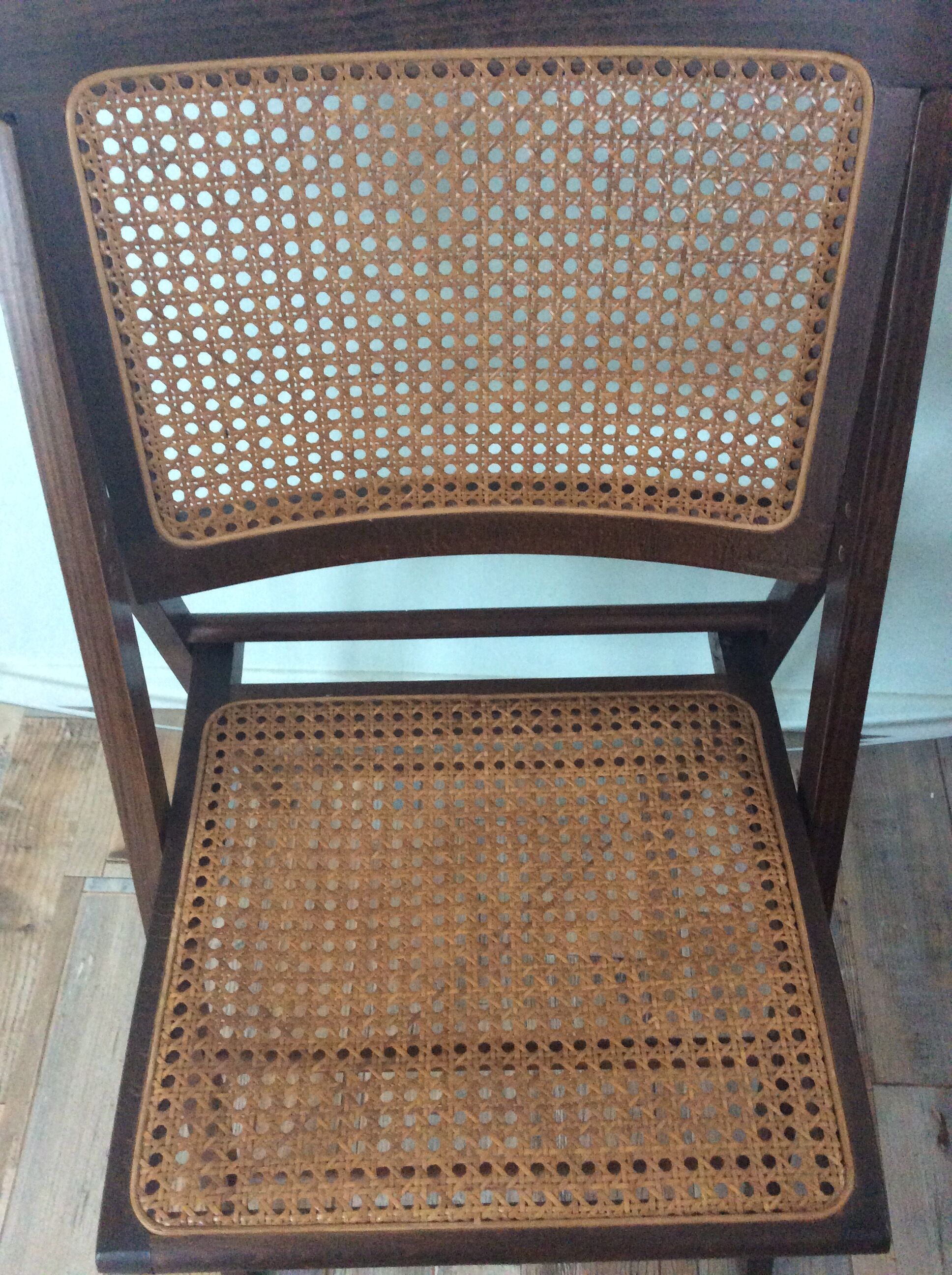 Folding chair caned from the 70s
