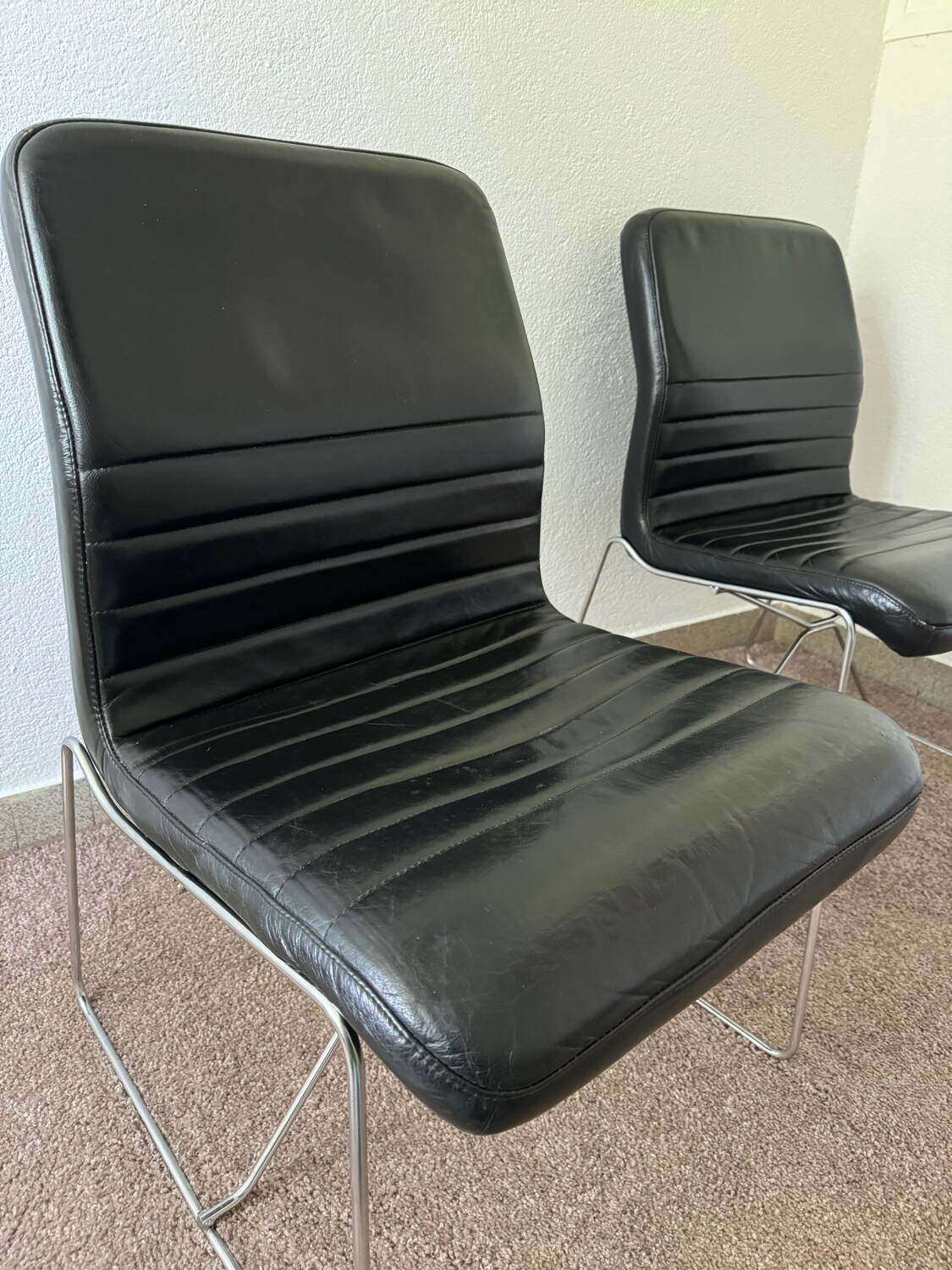 Black leather armchairs, Italian design, 70s (X2)