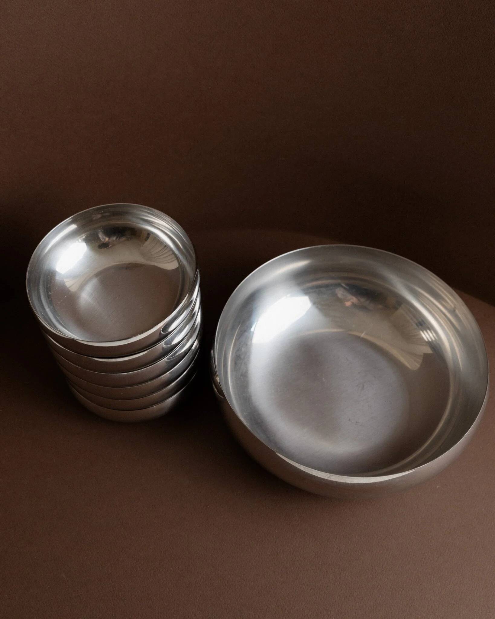Set of 7 silver stainless steel bowls Space Age vintage Italian design stackable and elegant