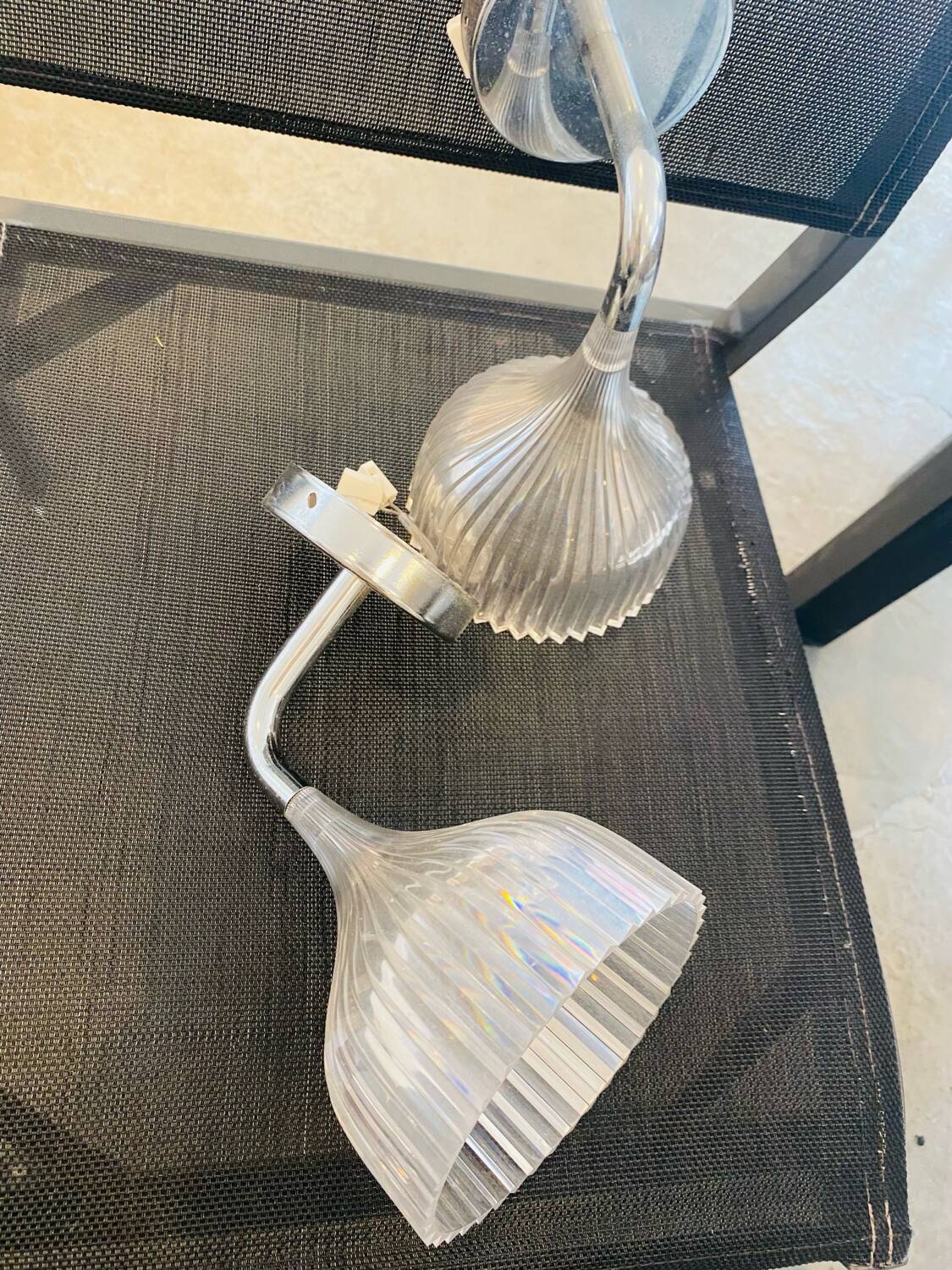 Many Kartell wall lamps.