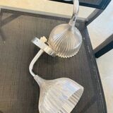 Many Kartell wall lamps.