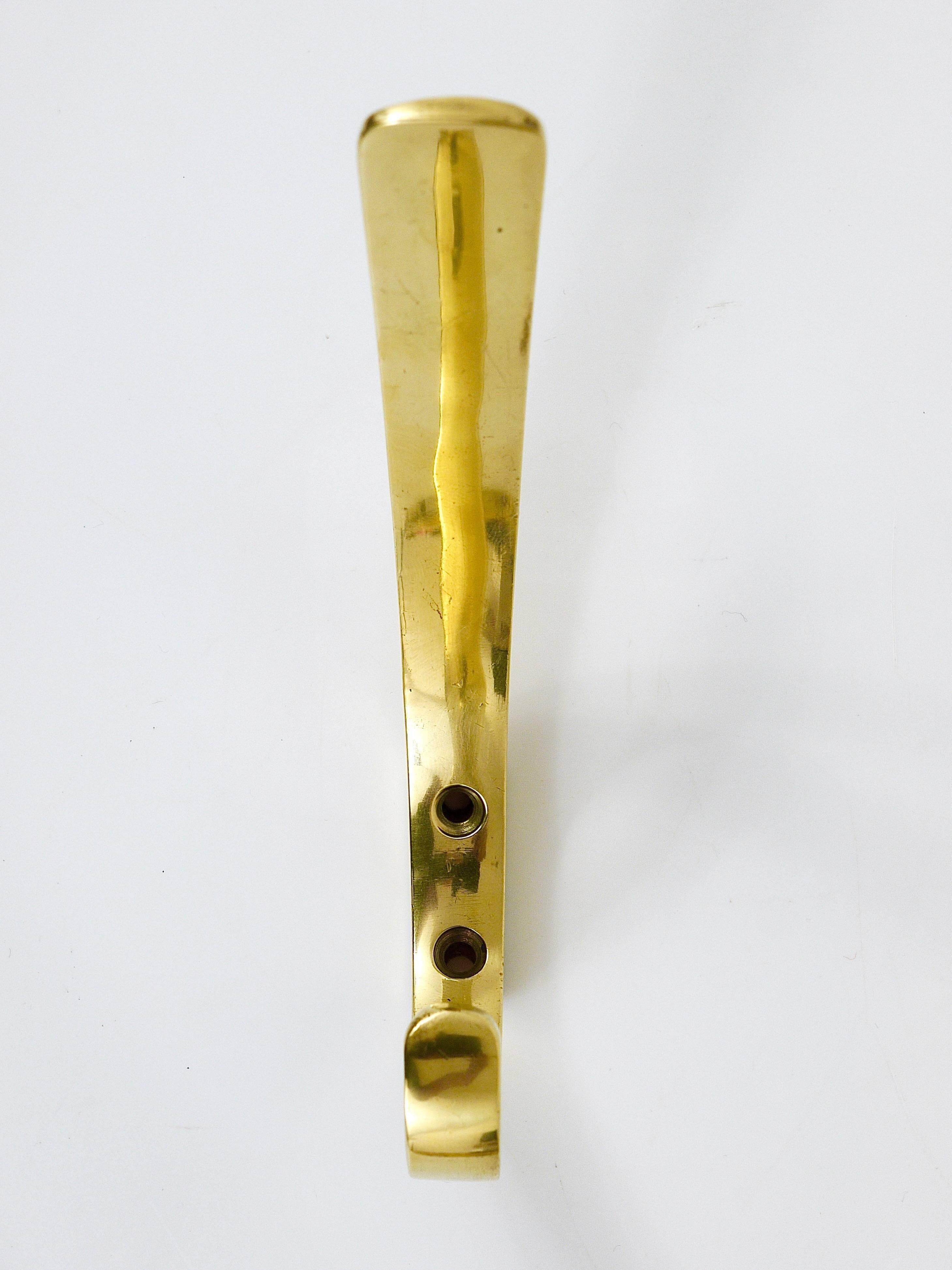 9 vintage brass wall hooks by Herta Baller, Vienna, Austria, 1950s.