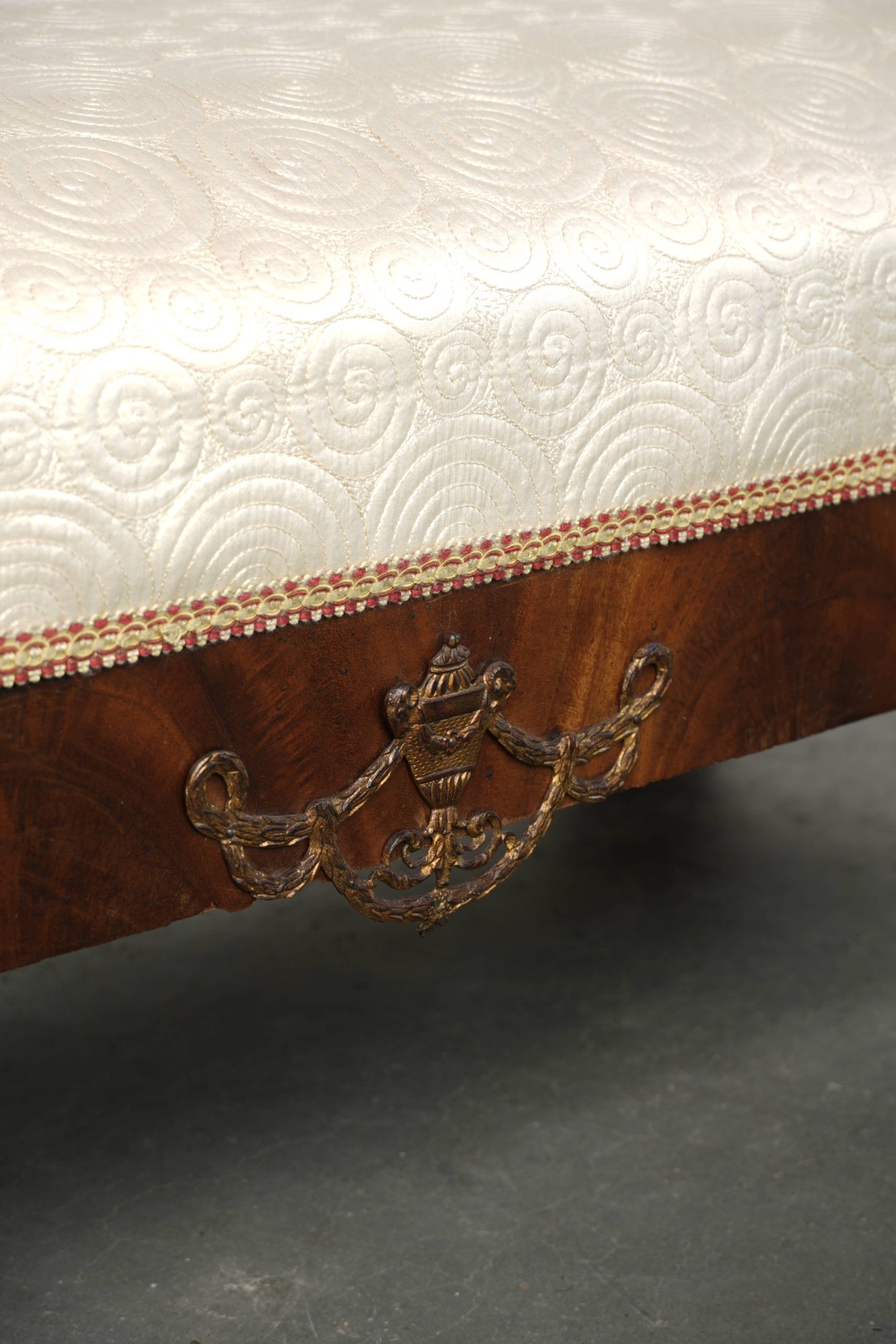 Antique French sofa from the 19th century in Empire style with a silk seat
