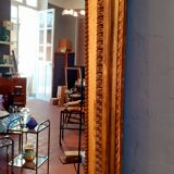 Large mirror XIX th in wood and gilded stucco Louis XVI style